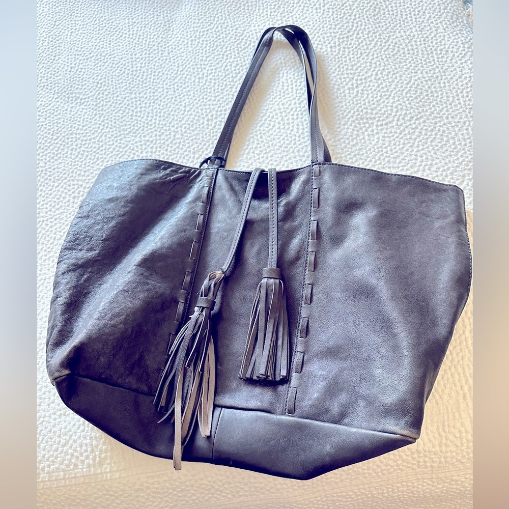 Navy Blue buttery leather bag purchased in England.